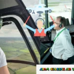 Adam Gillespie air traffic controller working in Norfolk control tower with radar equipment and headset