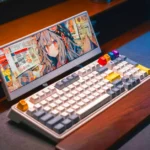 "VyvyManga platform displayed on laptop screen showing manga reading interface with colorful anime character, perfect for desktop manga enthusiasts"