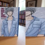 The Real Deal on Smut Manga guide book displayed in library setting showing complete 2025 adult manga recommendations