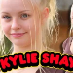 A professional photo of actress and model Kylie Shay smiling at the camera.