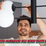 Man installing modern pendant lighting solutions for every home lumolog with white spherical LED fixtures