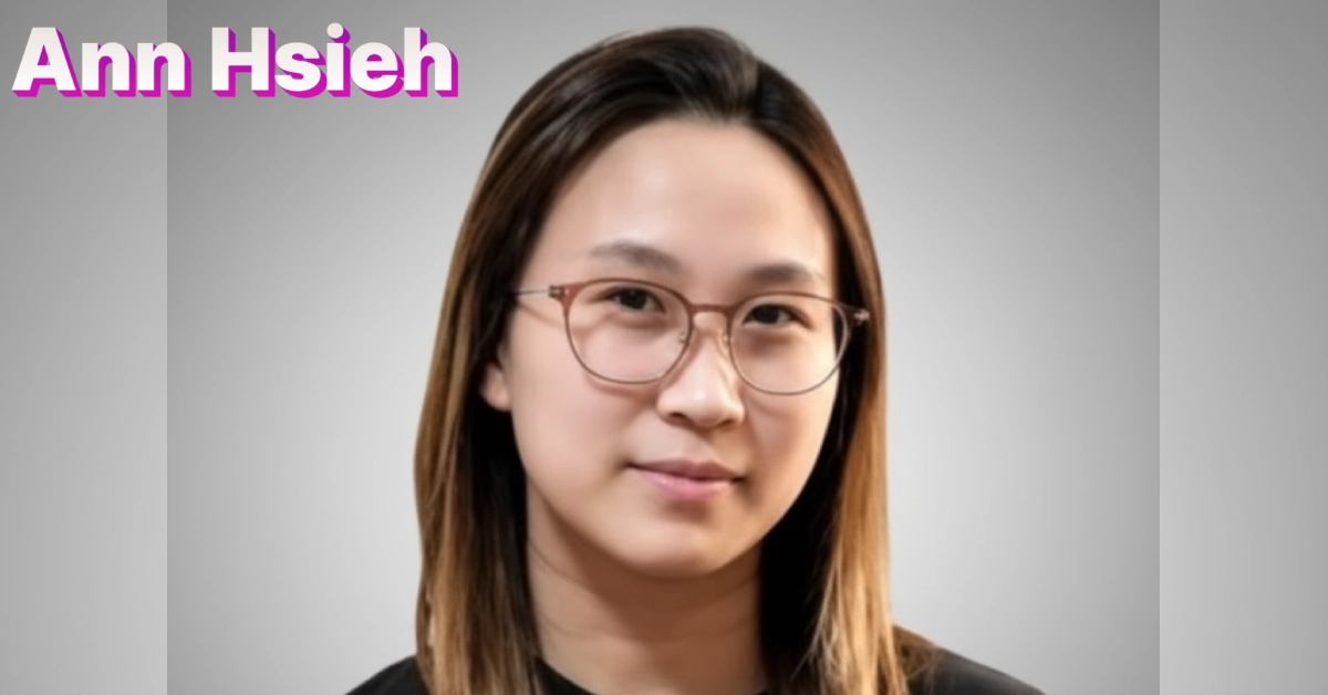 Ann Hsieh professional portrait wearing glasses against neutral background