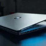 Geekzilla T3 laptop device silver design dark background blue lighting tech product