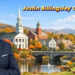 Professional portrait of a businessman representing Justin Billingsley Connecticut, set against a scenic autumn New England town with church, bridge, park, and modern buildings.