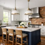 Kitchen remodeling alexandria project showing modern white cabinets marble countertops and historic exposed brick in renovated Virginia home