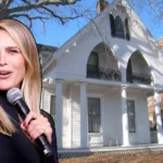 Sara Foster speaking next to the historic Gothic Revival Sara Foster House on Dana Street in Cambridge, Massachusetts, with distinctive bargeboards and arched windows.
