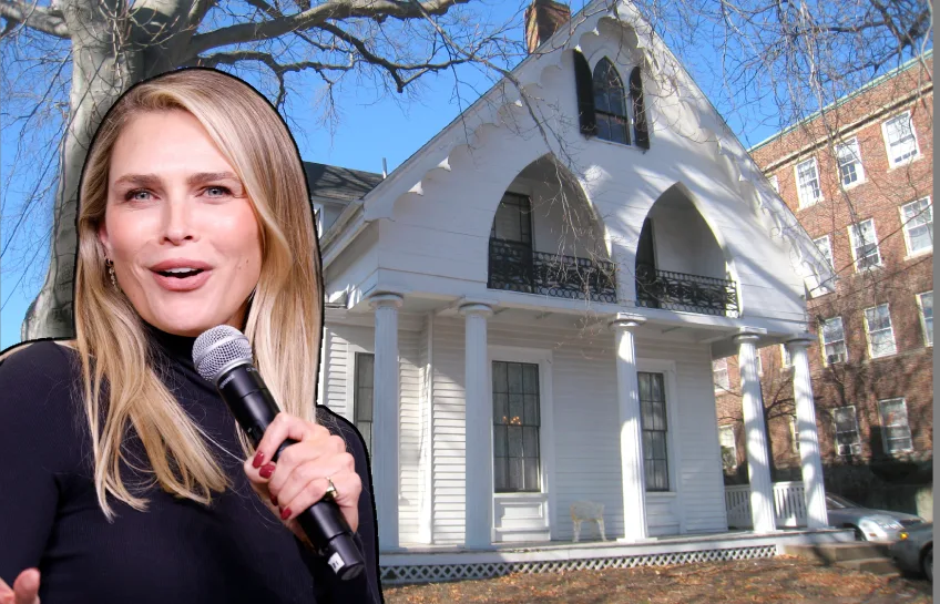 Sara Foster speaking next to the historic Gothic Revival Sara Foster House on Dana Street in Cambridge, Massachusetts, with distinctive bargeboards and arched windows.