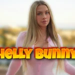 Shelly Bunnyy, Instagram model and content creator wearing pink top, posing against scenic outdoor background with water and sunset