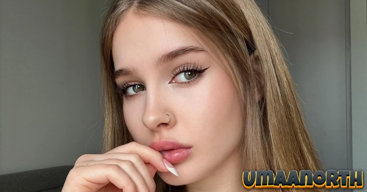 umaanorth Uma North close-up portrait selfie showing her natural beauty and authentic influencer style with blonde hair and green eyes