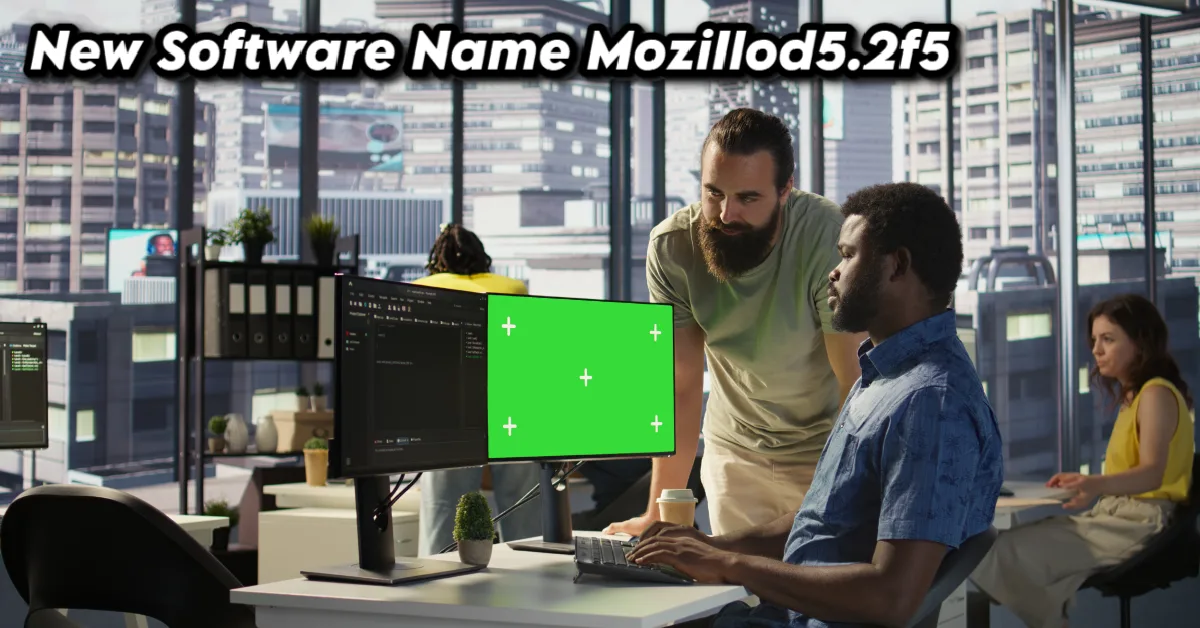 Two professionals collaborating on new software name mozillod5.2f5 displayed on computer screen in modern office workspace environment