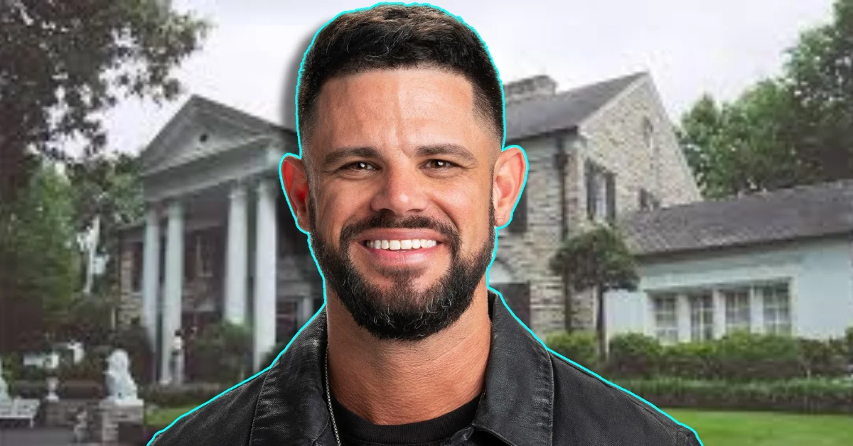 Steven Furtick smiling in front of his luxury Waxhaw mansion showing the stone exterior and landscaped grounds of his North Carolina estate