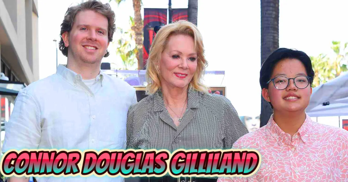 Connor Douglas Gilliland stands with mother actress Jean Smart and sibling at public event in rare family photo showing the private celebrity son
