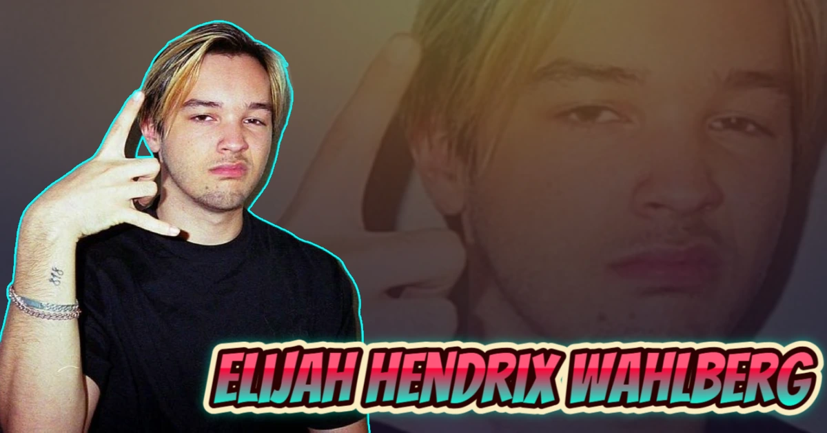 Elijah Hendrix Wahlberg posing in black shirt with blonde hair and hand gesture, son of Donnie Wahlberg and rising musician