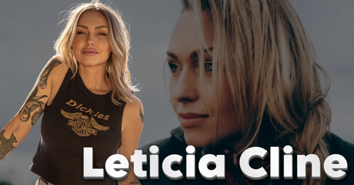 Leticia Cline blonde woman with tattoos wearing motorcycle Dickies shirt posing confidently